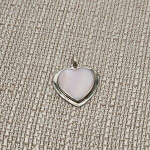 Rare Sterling silver pinkish mother of pearl heart pendant with bale.   Sweet!